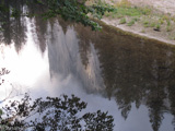 Water still plays a role in Yosemite today. The park's famous waterfalls feed into the Merced River, which continues to erode the Yosemite Valley, occasionally causing floods in the park.